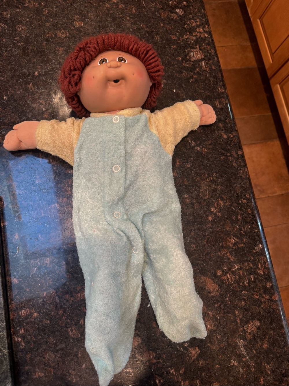 Kissy Kissy Plush Doll with Light Blue Romper and Brown Yarn Hair